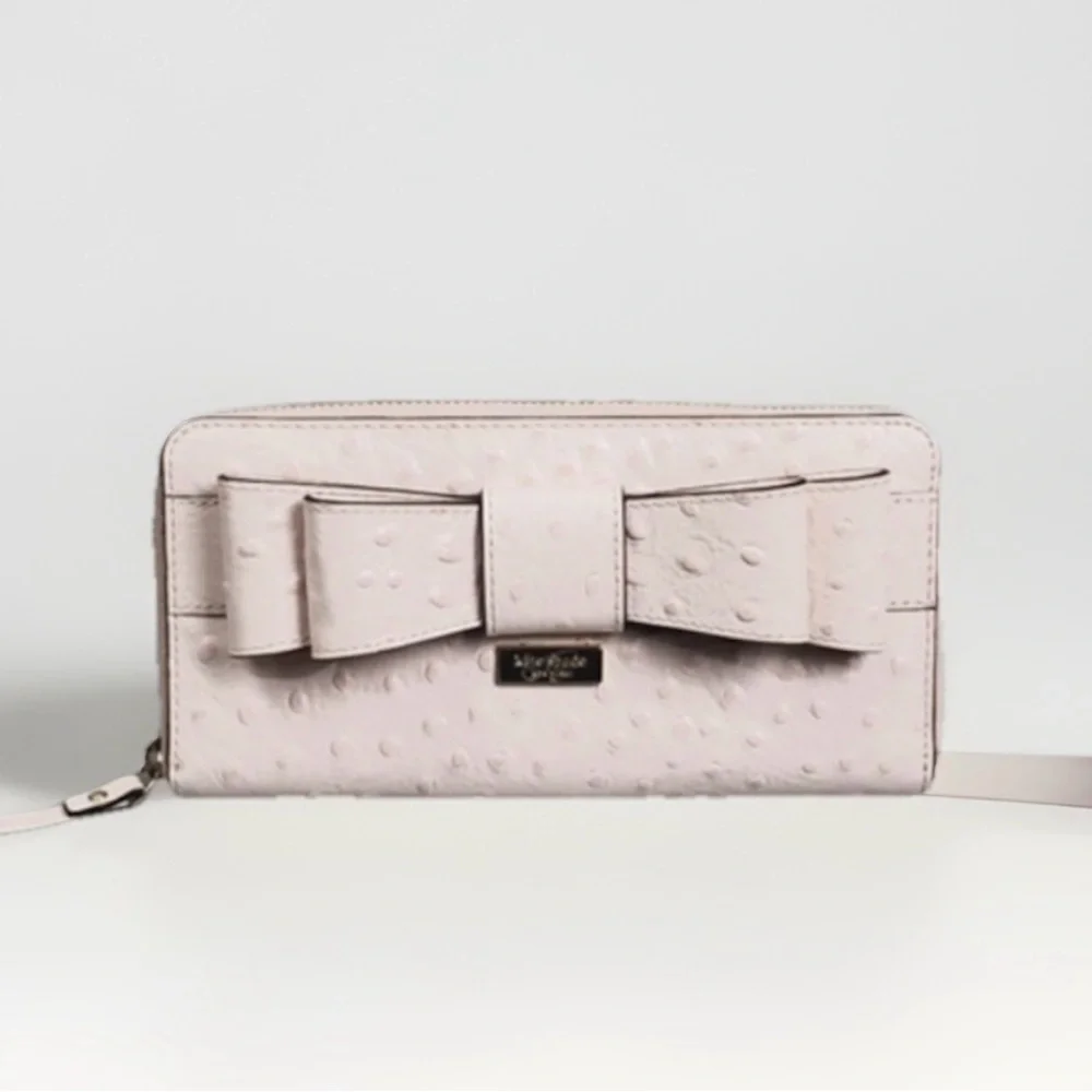 Kate Spade blush pink ostrich leather Large Bow zip round wallet